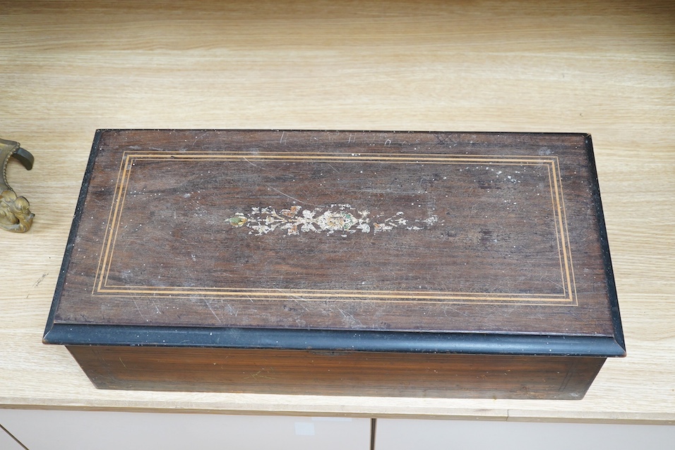 A 19th century Swiss cylinder music box, 58cm wide. Condition - fair to good, considerable wear to case